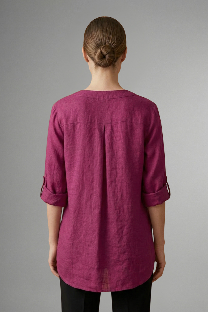 Casual women's linen blouse with button closure & roll sleeves. Loose fit V-neck top, perfect for summer fashion.