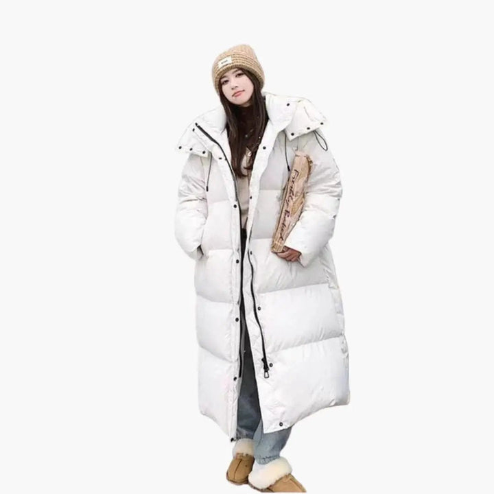 Warm women's long winter coat, a hooded puffer jacket designed for ultimate cold weather protection.