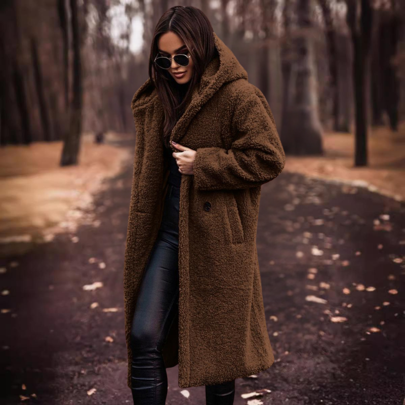 Elegant women's long hooded teddy coat, designed for maximum warmth and a sophisticated winter fashion look.