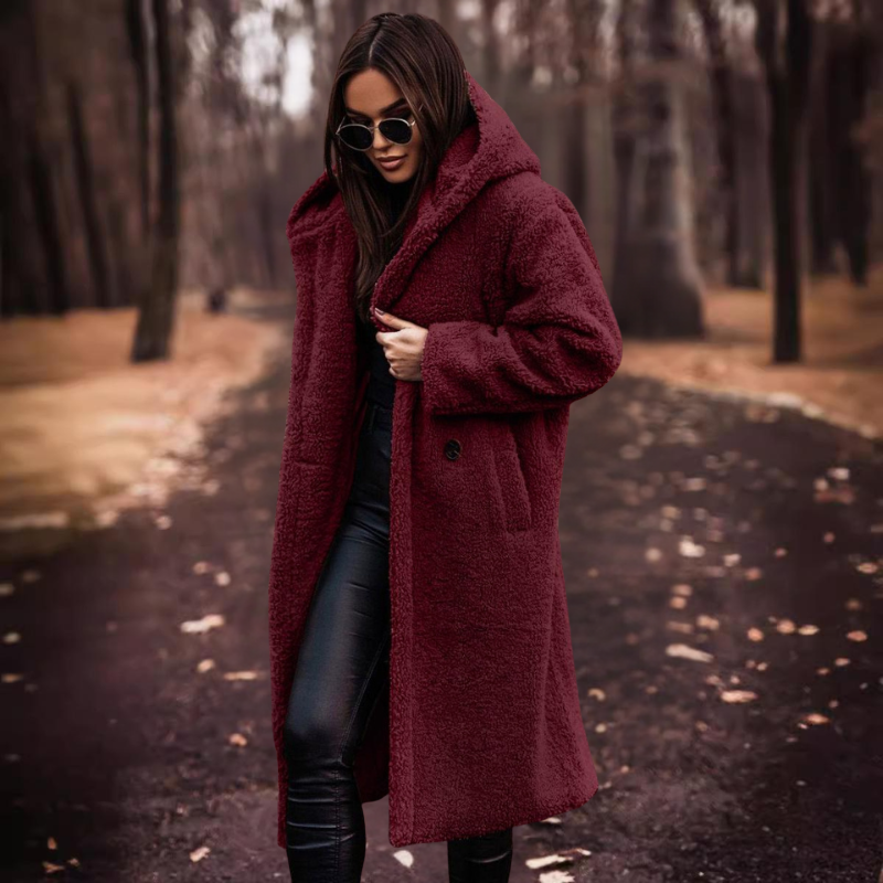 Plush long hooded teddy coat for women, ensuring supreme warmth and a luxurious feel during winter.