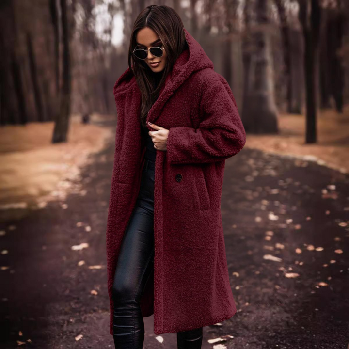 Plush long hooded teddy coat for women, ensuring supreme warmth and a luxurious feel during winter.