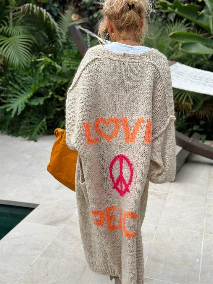 Long oversized knit cardigan for women, combining bohemian style with cozy, relaxed fit.