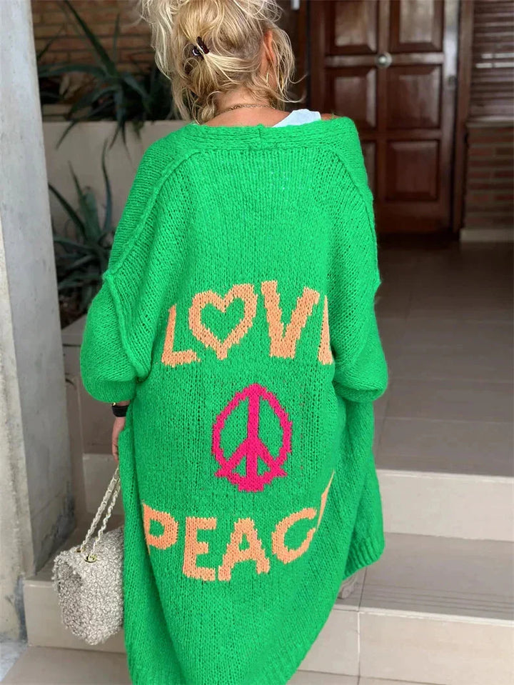 Vibrant bohemian oversized knit cardigan. A women's longline statement piece for relaxed fashion.