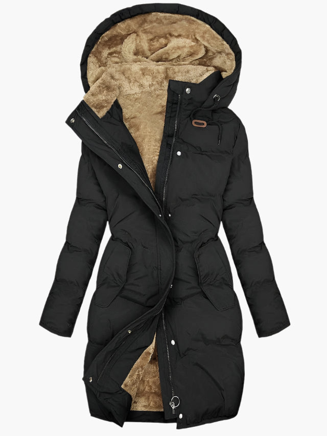 Fashionable women's long quilted winter coat with hood, perfect for cold weather
