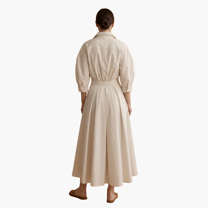 Versatile women's maxi shirt dress. Features a button front & structured waist. Perfect for day or evening.