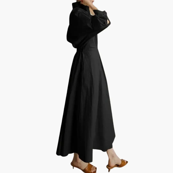Classic women's shirt dress. Long, button front, and defined waist. Ankle length for elegant everyday wear.