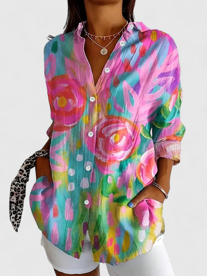 Women's long sleeve floral abstract print button down blouse. Casual, vibrant spring/summer fashion.