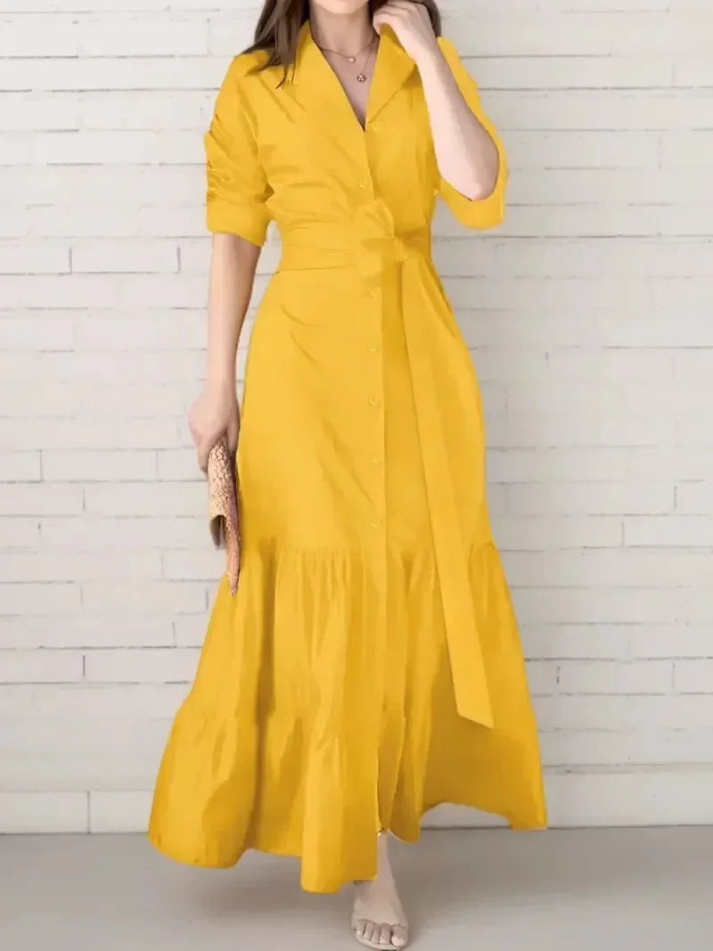Chic women's long sleeve tiered maxi shirt dress featuring a removable tie waist. Ideal for elegant or casual occasions.