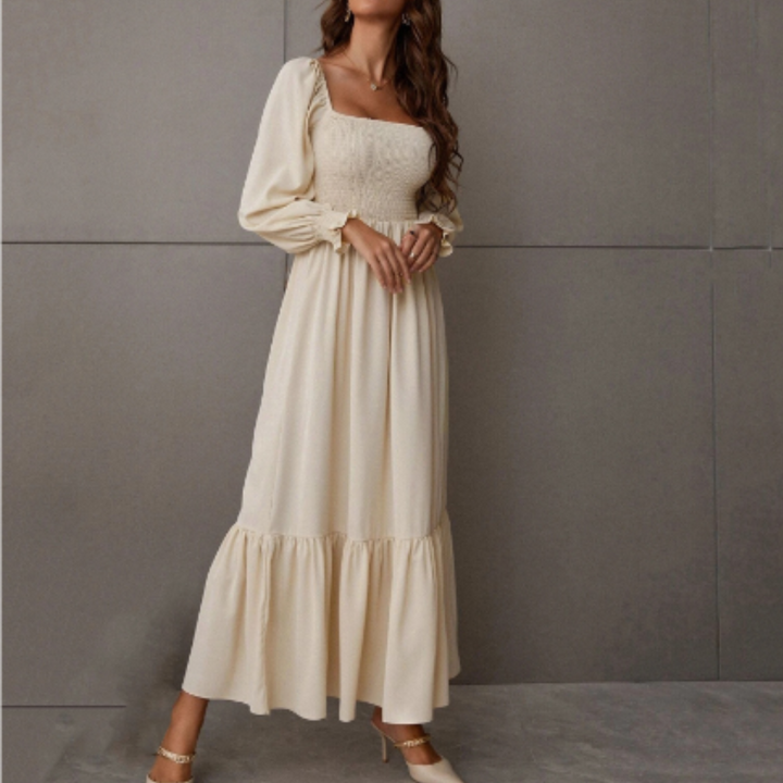 Chic women's transitional dress. Long sleeve design with a unique Florentine neckline, ideal for versatile styling.