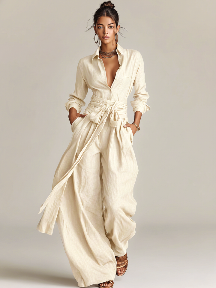 Oversized women's long sleeve wide leg jumpsuit with tie waist, a comfortable and stylish maxi dress alternative.