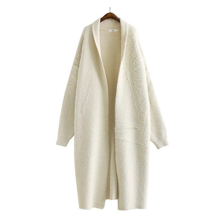 Elegant women's summer cardigan, open front style, light pink, shown draped for versatile wear.