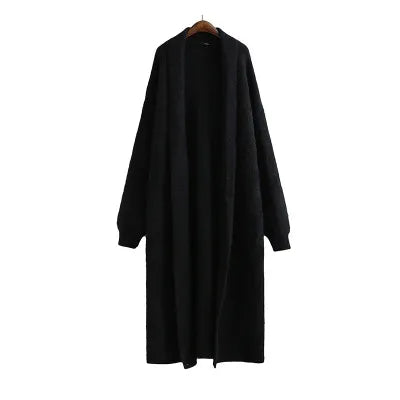 Versatile women's longline cardigan, open front, in a neutral color, suitable for various outfits.