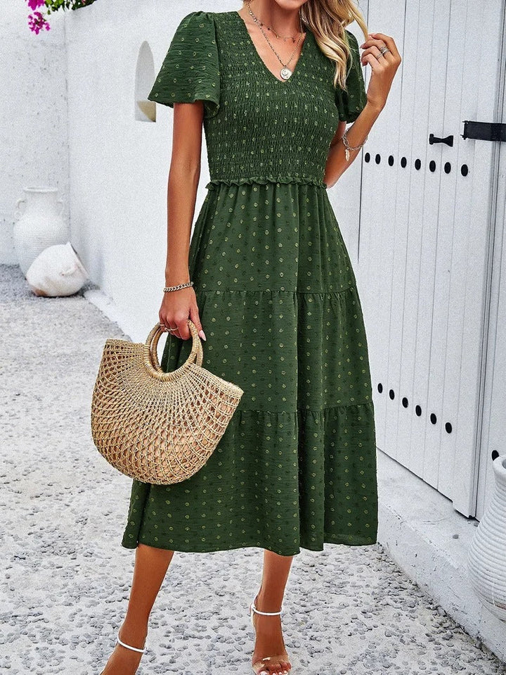 White loose fit women's midi dress, comfortable & stylish for autumn casual wear.