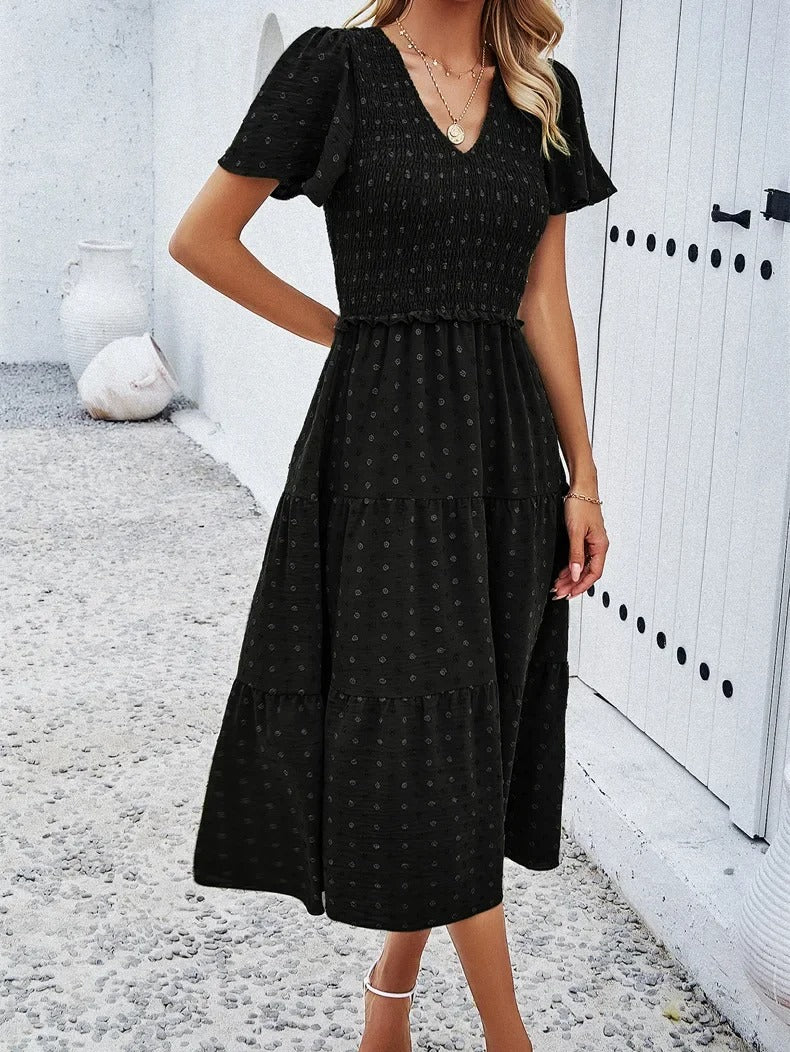Black comfortable autumn dress, women's loose fit midi for versatile everyday fashion.