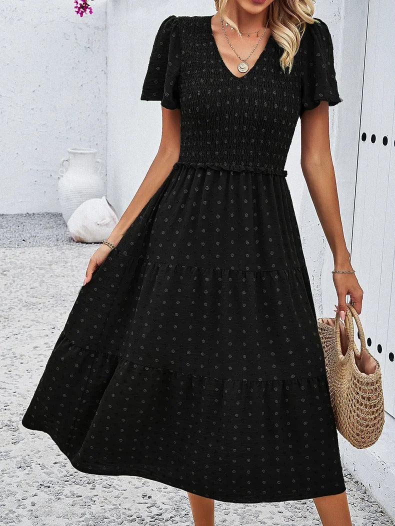 Stylish black loose fit dress, women's midi for fall, comfortable & casual wear.