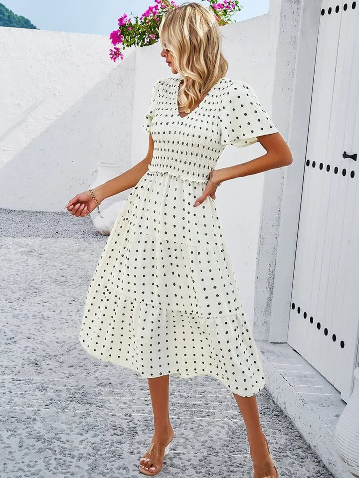Women's autumn midi dress, comfortable, loose fit, in various colors for stylish everyday wear.