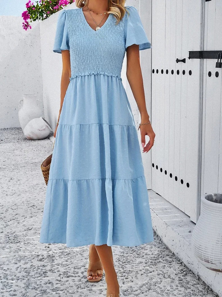 Women's autumn dress, loose fit & comfortable, perfect versatile midi for casual fall fashion.