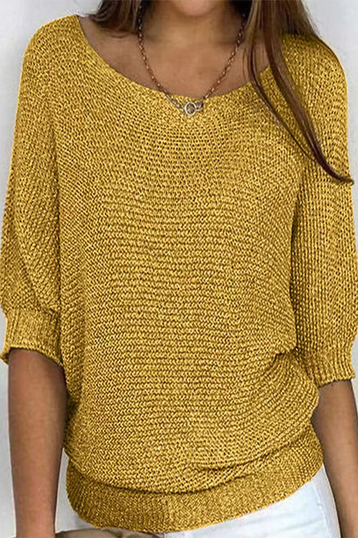 Women's loose fit batwing sleeve sweater in a versatile knit, perfect for stylish autumn and winter comfort.