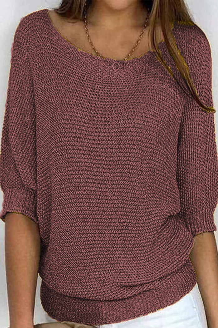 Stylish women's knit sweater with flattering batwing sleeves and a comfortable loose fit.