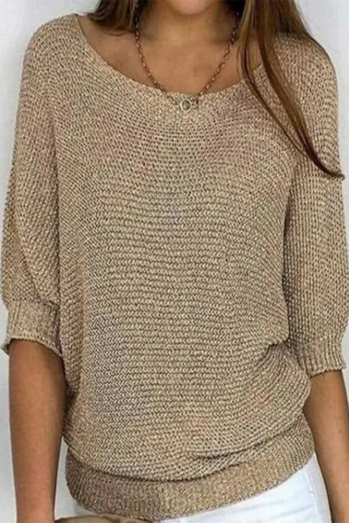 Relaxed fit women's sweater with elegant batwing sleeves, suitable for casual & stylish wear.