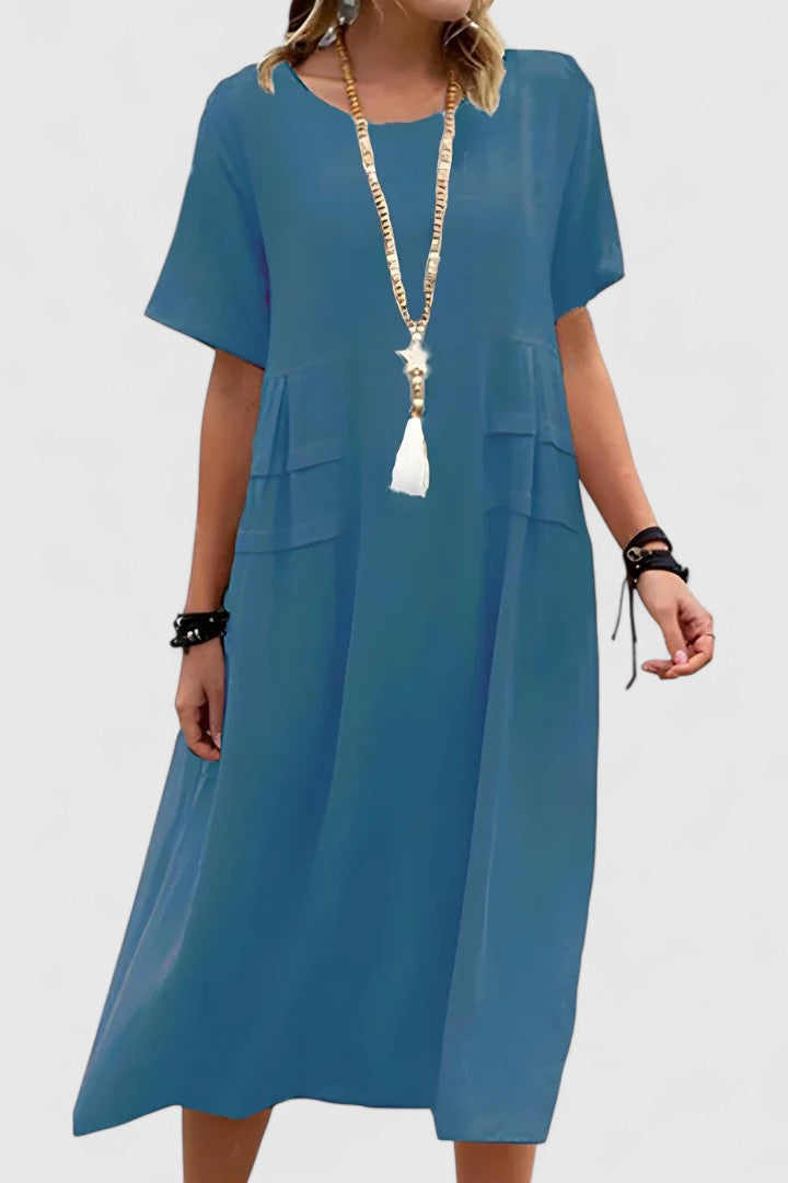 Comfortable women's short sleeve midi dress, loose fit & practical pockets. Ideal casual summer dress for daily wear.