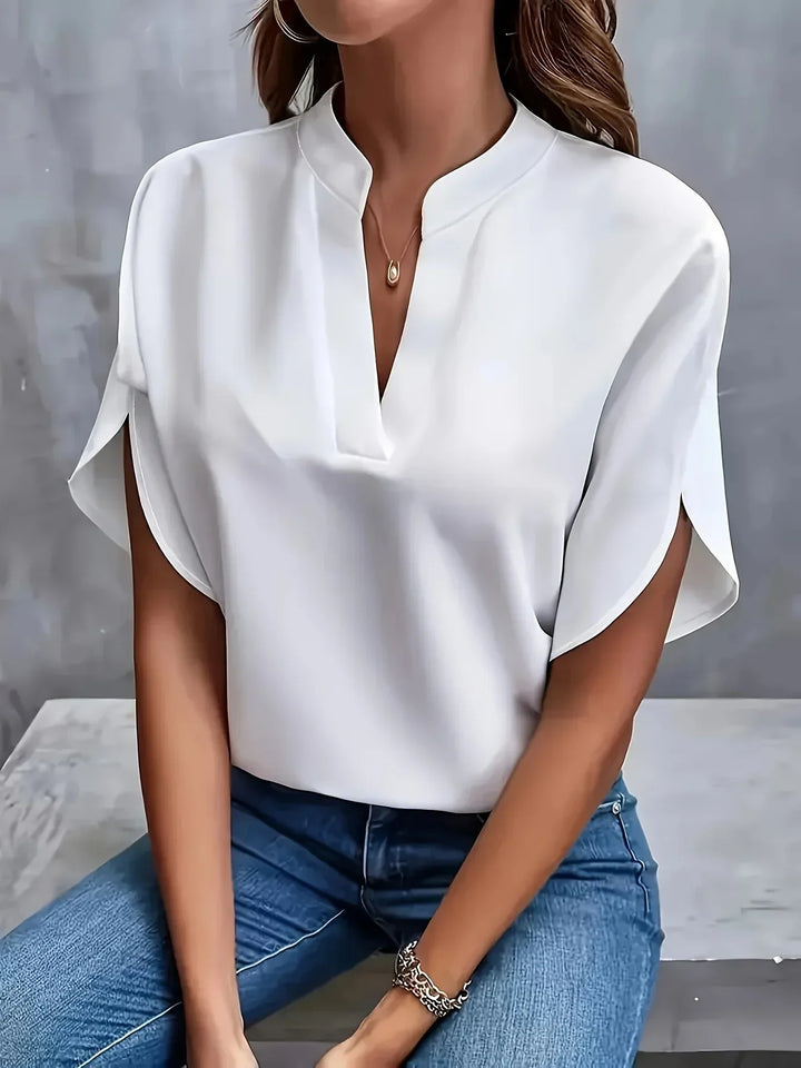 Elegant women's V-neck loose fit short sleeve blouse, a comfortable and stylish summer top.