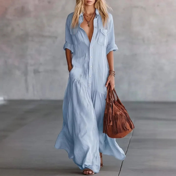 Flowy women's tiered maxi dress with button-down front. Relaxed fit for comfortable everyday wear or elegant travel.
