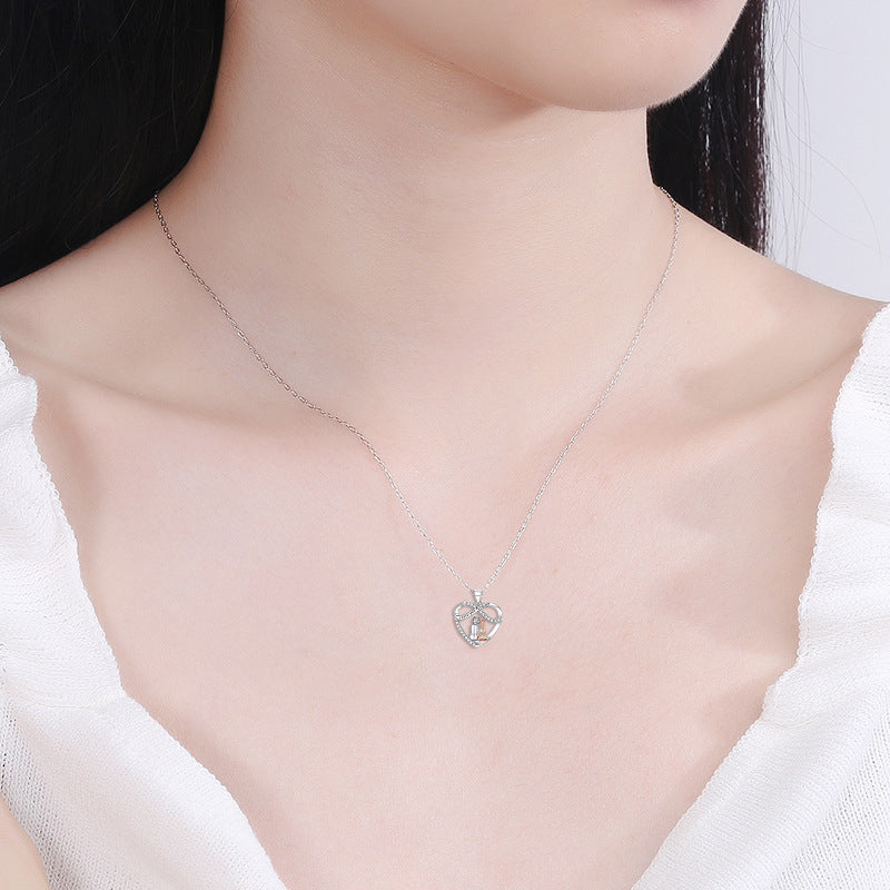 Model wearing 'Love You Forever' heart pendant necklace, showcasing its size and how it drapes elegantly on the neck