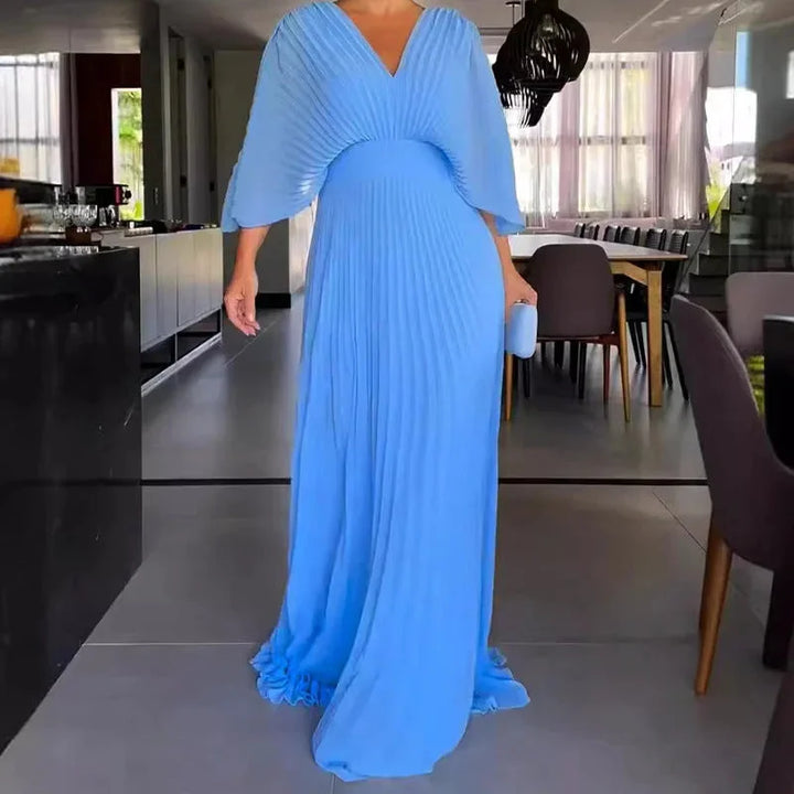 Women's elegant V-neck pleated maxi dress, a comfortable kaftan for wedding guests or summer parties.