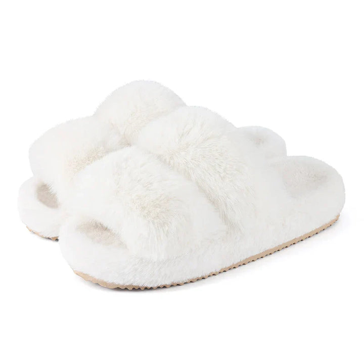 Women's Luxe Faux Fur Slide Slippers in a soft, plush pink, perfect for cozy homewear comfort.