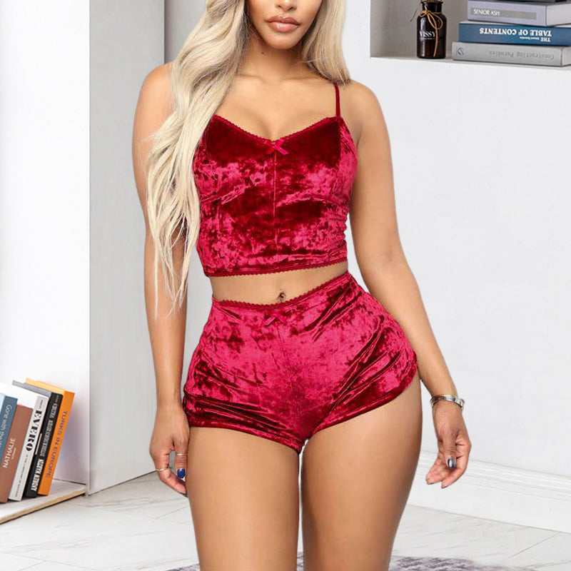 Comfortable peach velvet V-neck loungewear set, a chic cami and shorts for restful sleep
