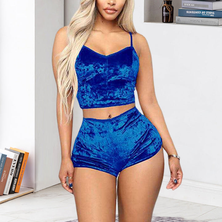 Back view of a women's silver velvet V-neck cami and shorts set, showcasing the relaxed fit