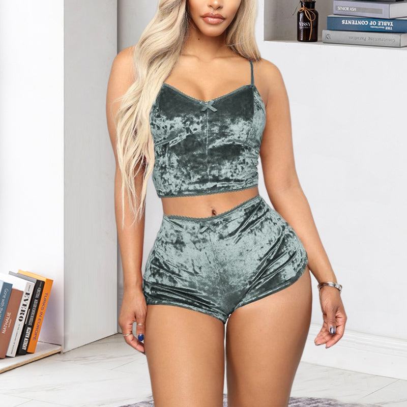 Front view of a white velvet V-neck cami pajama set with adjustable straps and elastic shorts