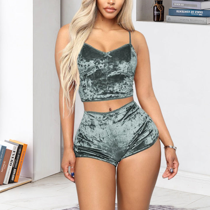 Front view of a white velvet V-neck cami pajama set with adjustable straps and elastic shorts