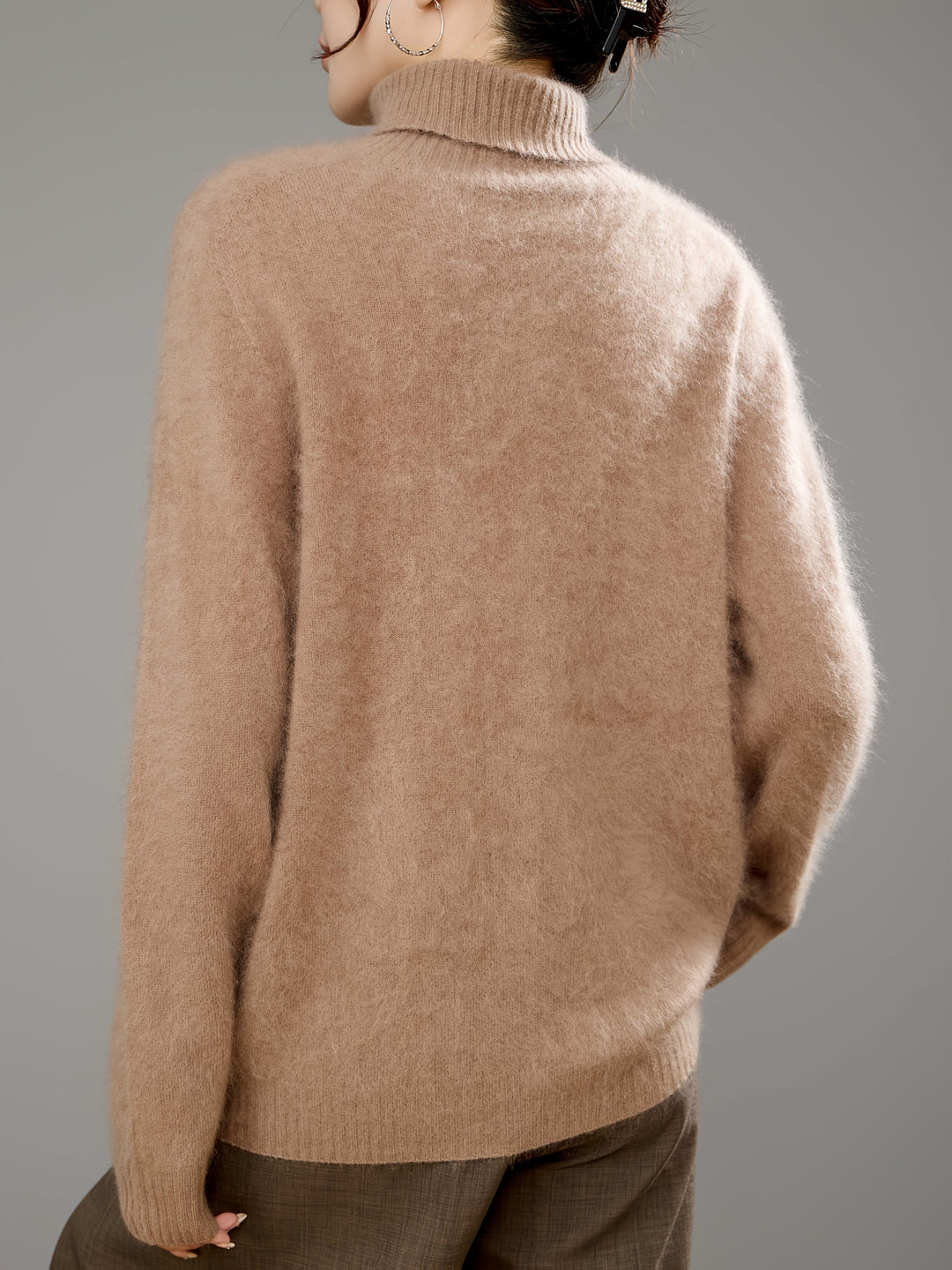 Warm & elegant women's turtleneck sweater, a luxurious addition to any winter wardrobe.