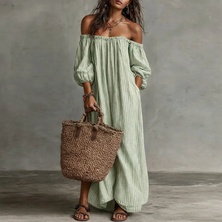 Elegant women's Madison midi dress, off-shoulder neckline and puff sleeves for a chic, feminine look.