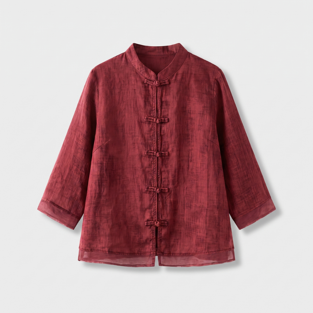 Tailored women's blouse with mandarin collar & frog buttons, sophisticated and comfortable.