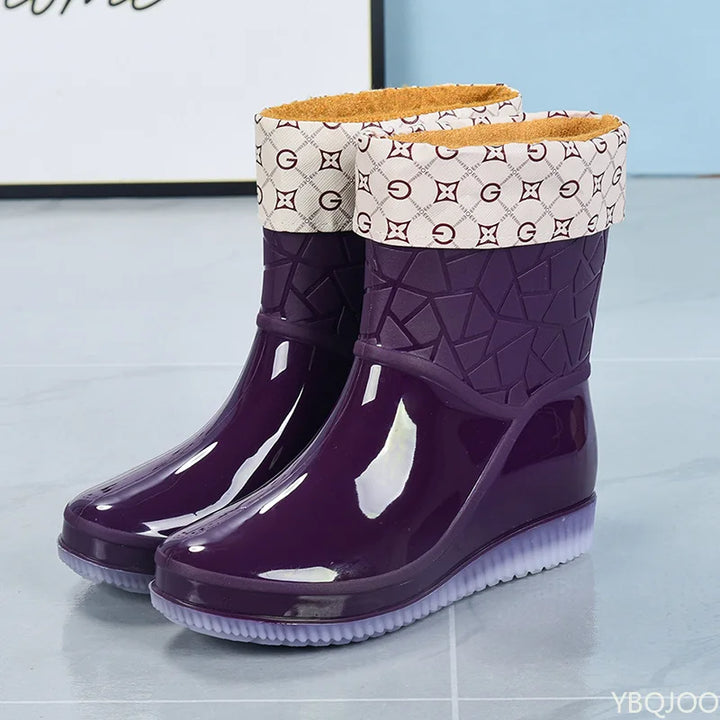Durable women's rain boots with anti-slip sole, stylish pattern & waterproof construction.