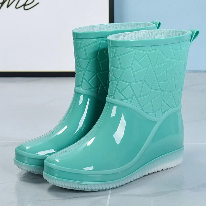 Fashionable women's rain boots, waterproof, patterned, ideal for wet weather & gardening.