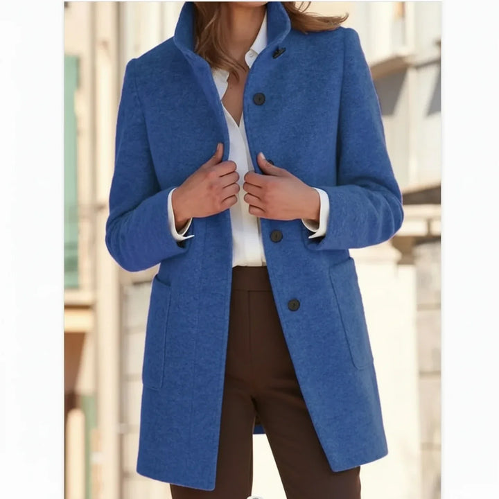 Warm women's mid-length winter coat with button front. Versatile fall outerwear for stylish women.