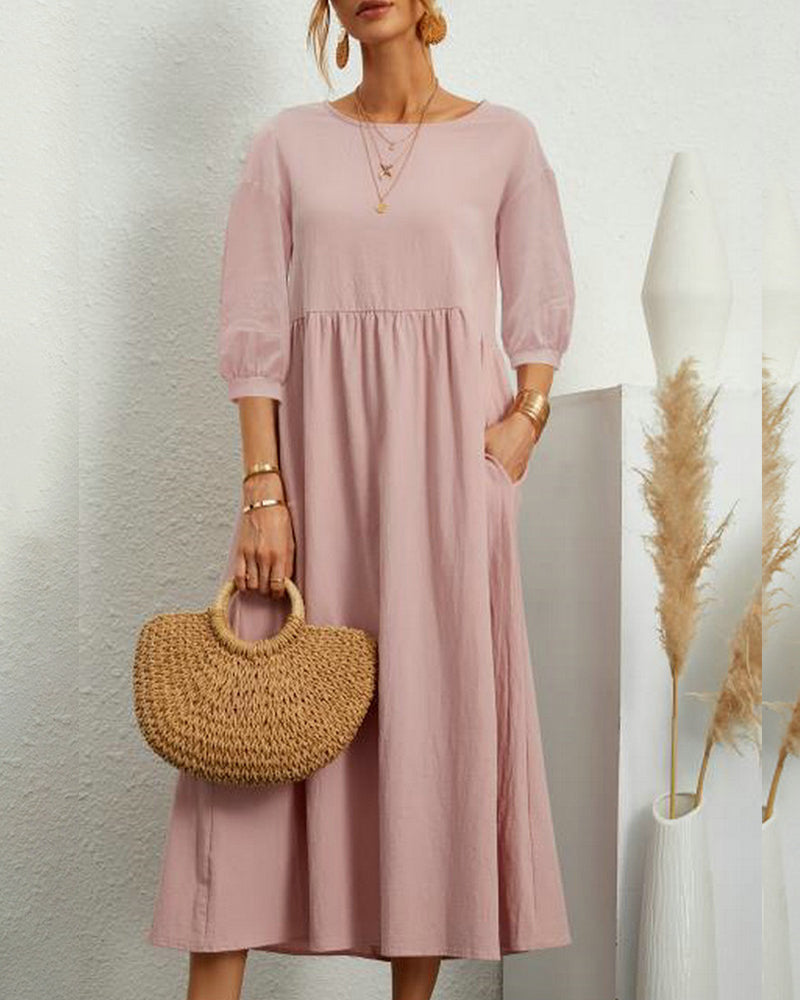 Classic women's midi dress with a flattering round neckline and stylish lantern sleeves, great for any season.