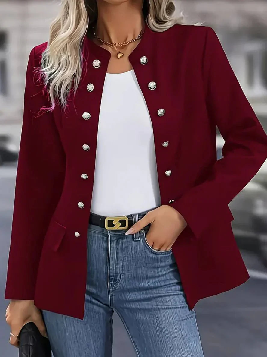 Elegant women's long sleeve button-down top with military style details, great for professional attire.