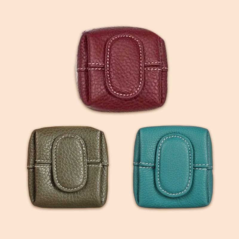 Mini embossed croc-print black leather coin purse, adding texture and luxury
