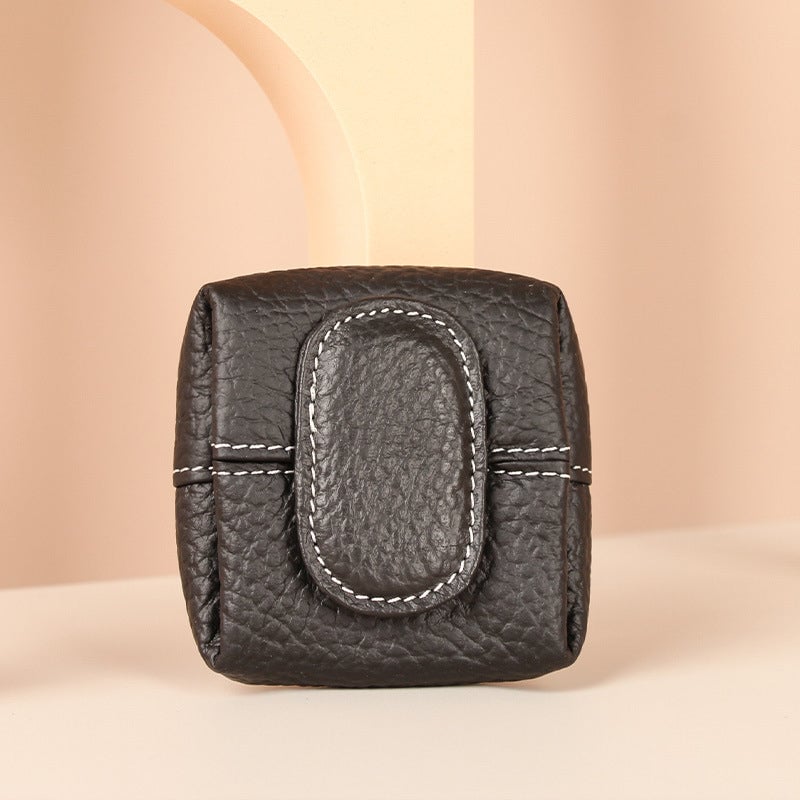 Mini gold leather coin purse, a glamorous and compact accessory for evenings