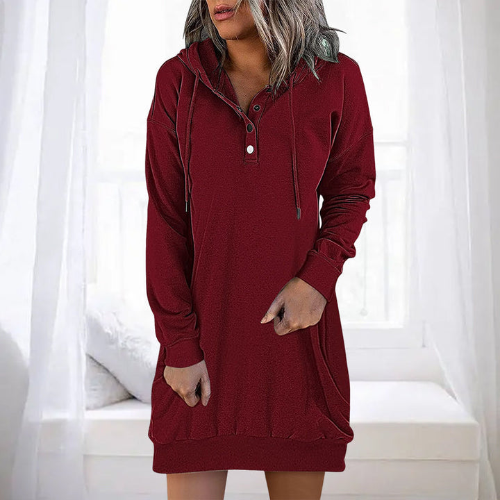 Chic women's long hoodie, minimalist design with a loose fit, great for casual comfort and style.