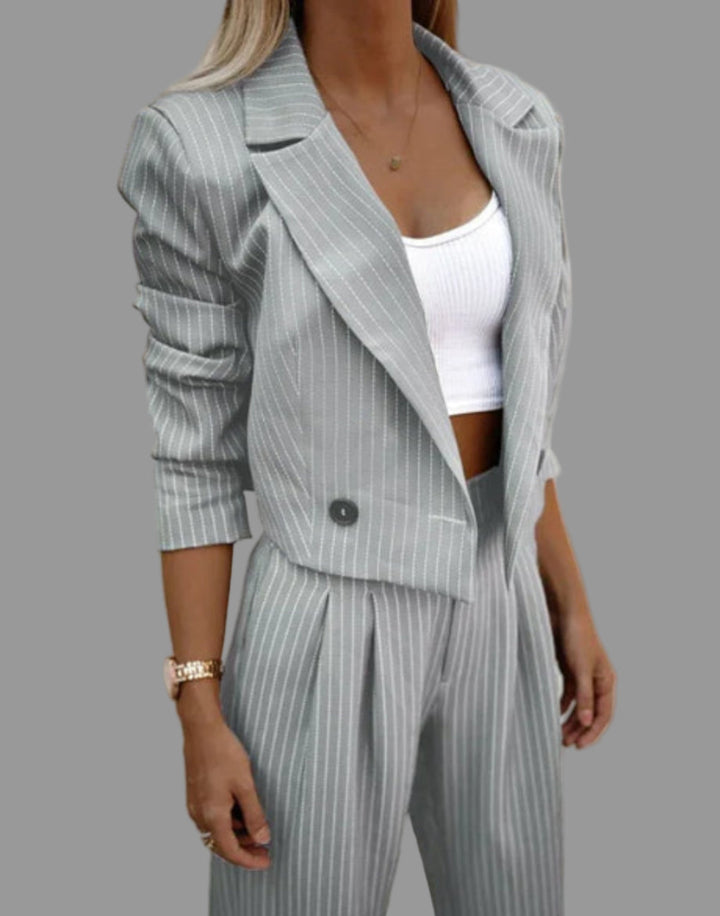 Chic women's grey modern business suit set, a stylish two-piece professional outfit for office and fashion.