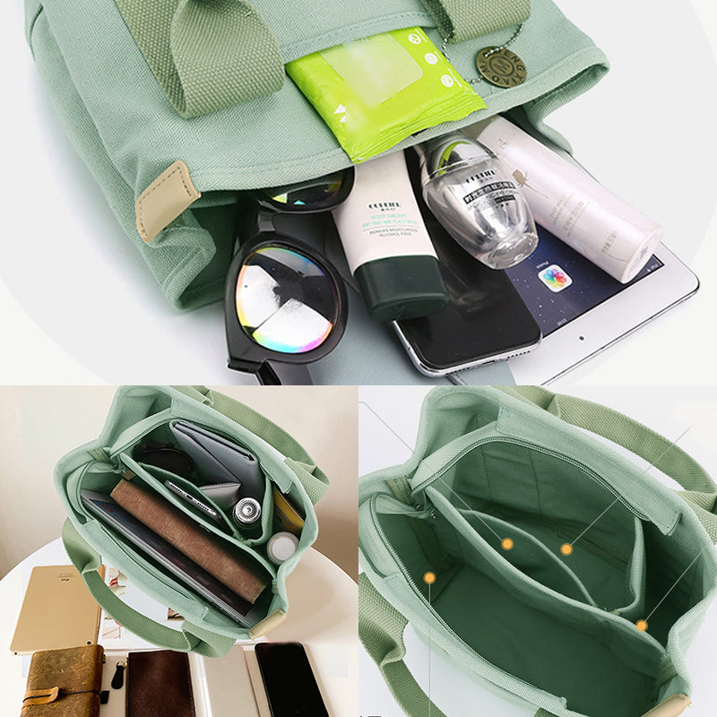 Women's stylish and functional canvas handbag with a clearly visible multi-pocket design