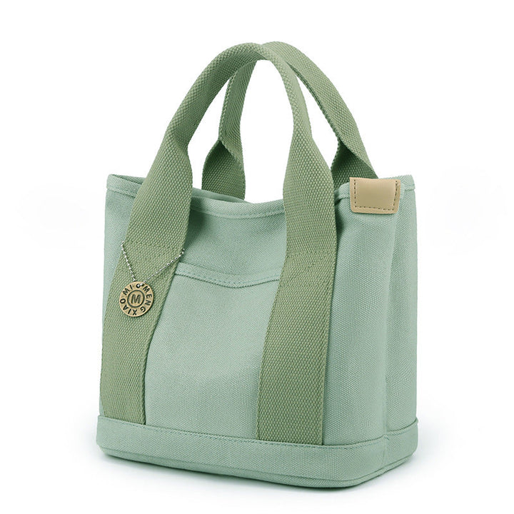Women's practical multi-pocket canvas bag, designed for easy access to belongings