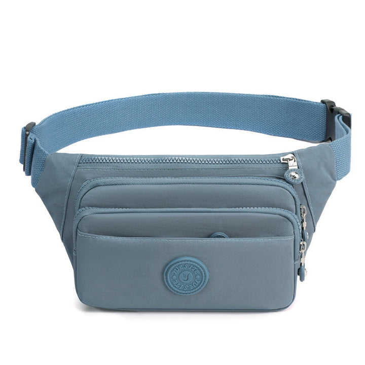 Women's multi-pocket nylon bag styled as a waistbag, offering hands-free convenience