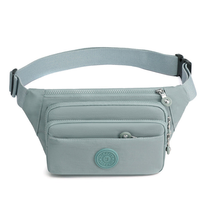 Spacious interior of a women's multi-pocket nylon crossbody bag, showing its capacity